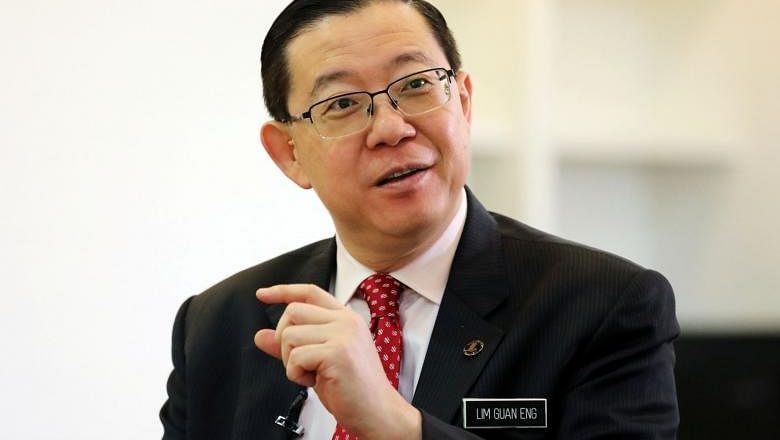 Kepala polisi Malaysia membantah putra mantan menteri keuangan Lim Guan Eng ditangkap di Singapura